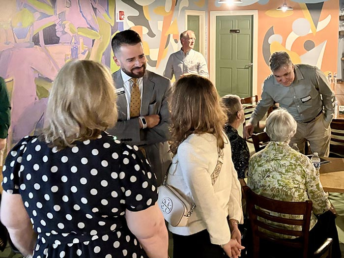 President/CEO Chris Gomez talks to members at 69th Annual Meeting of HFCU