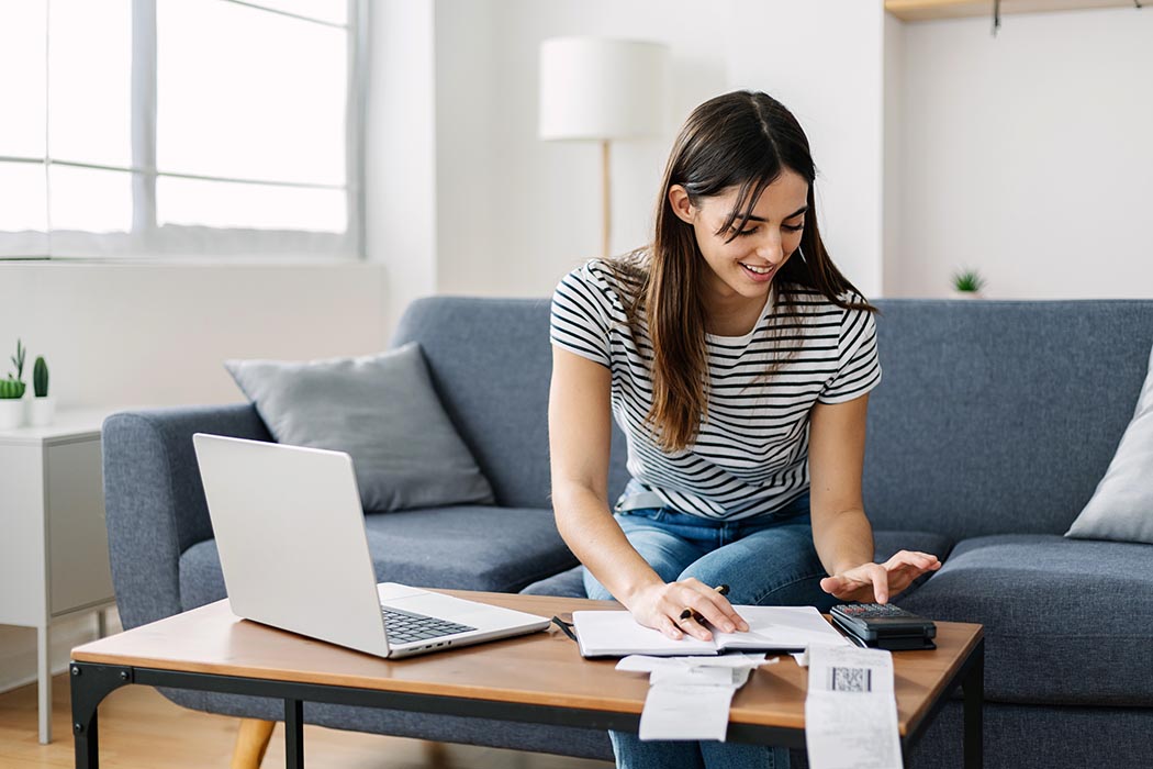 Woman calculating household bills